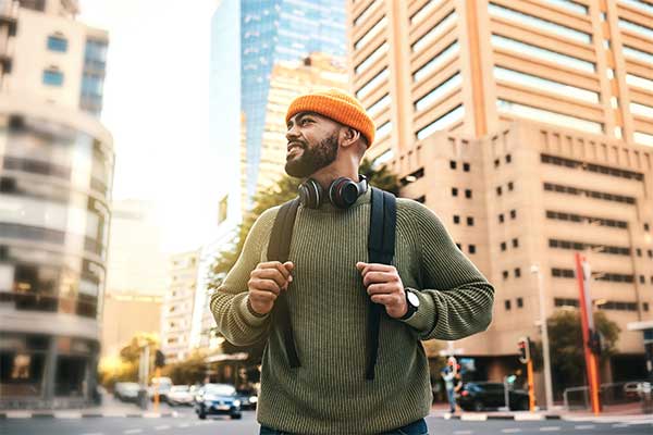 Person smiling looking at a city