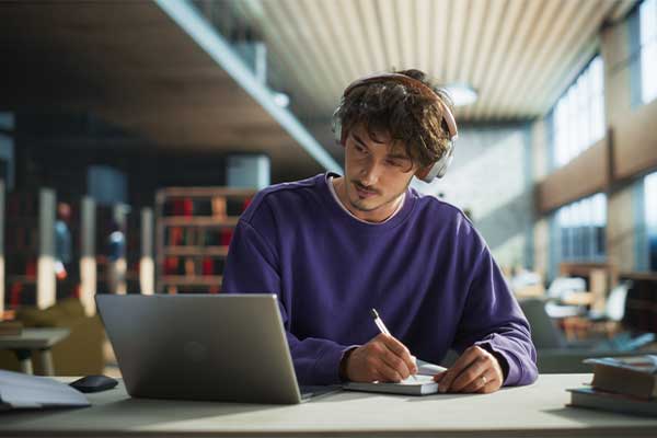Person studying with headphones on