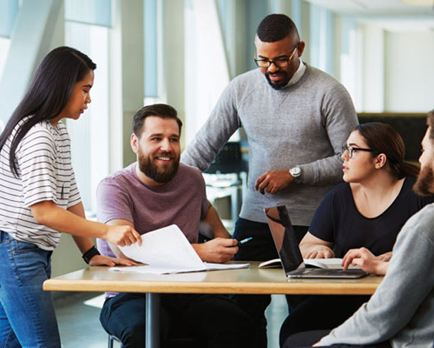 Group of students working together at a table