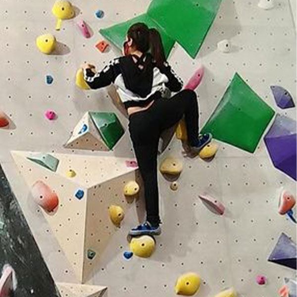 Rachel indoor rock climbing