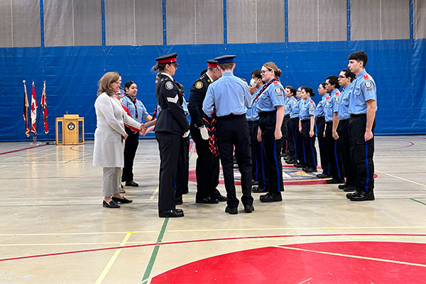 Police foundations students being formally invested by the 22 Division TPS Unit Commander, Anthony Paoletta 