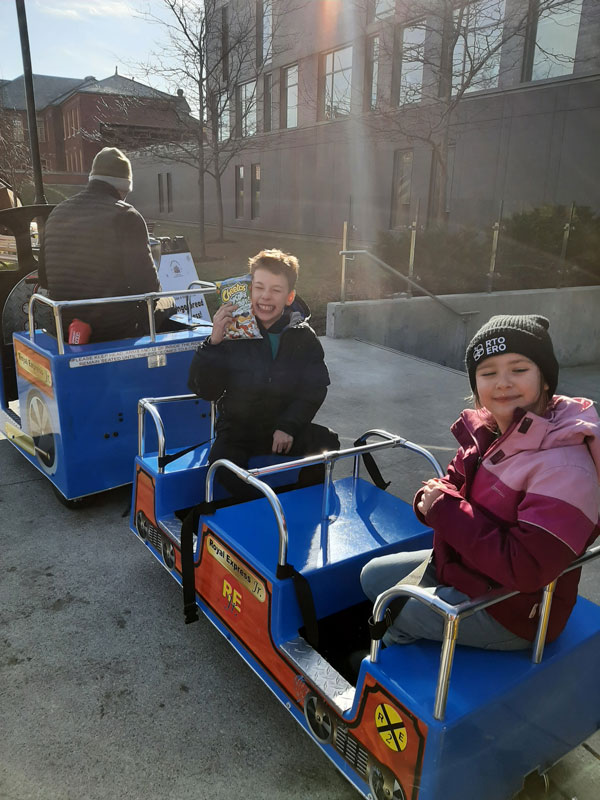 Children riding in miniature train