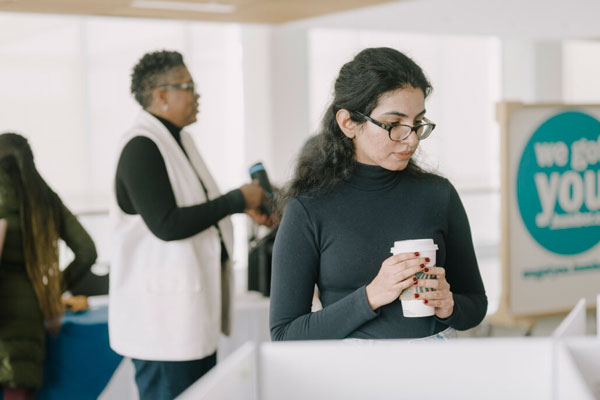 Person looking at pop up exhibit displays