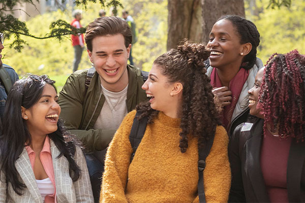 group of students laughing together